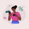 African american girl with credit card and phone. Investing money to receive interest Royalty Free Stock Photo